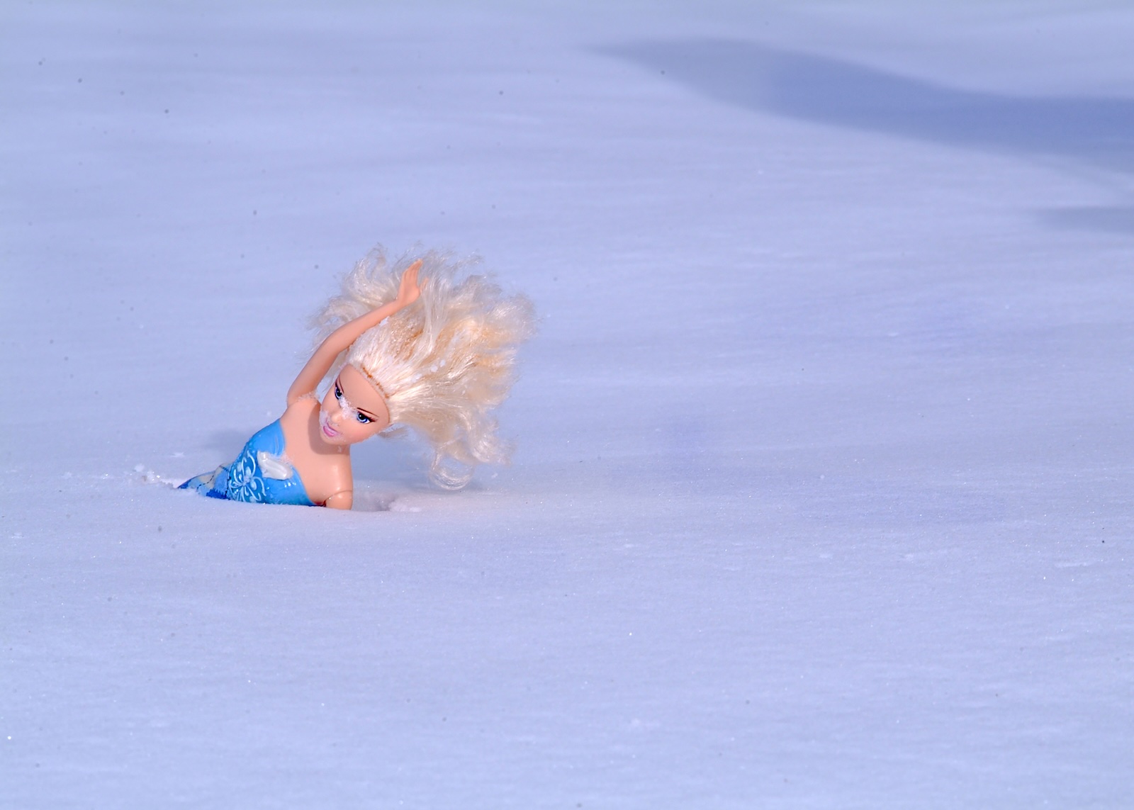 Barbie gone wild swims in the Canadian Winter. Capture the art of life